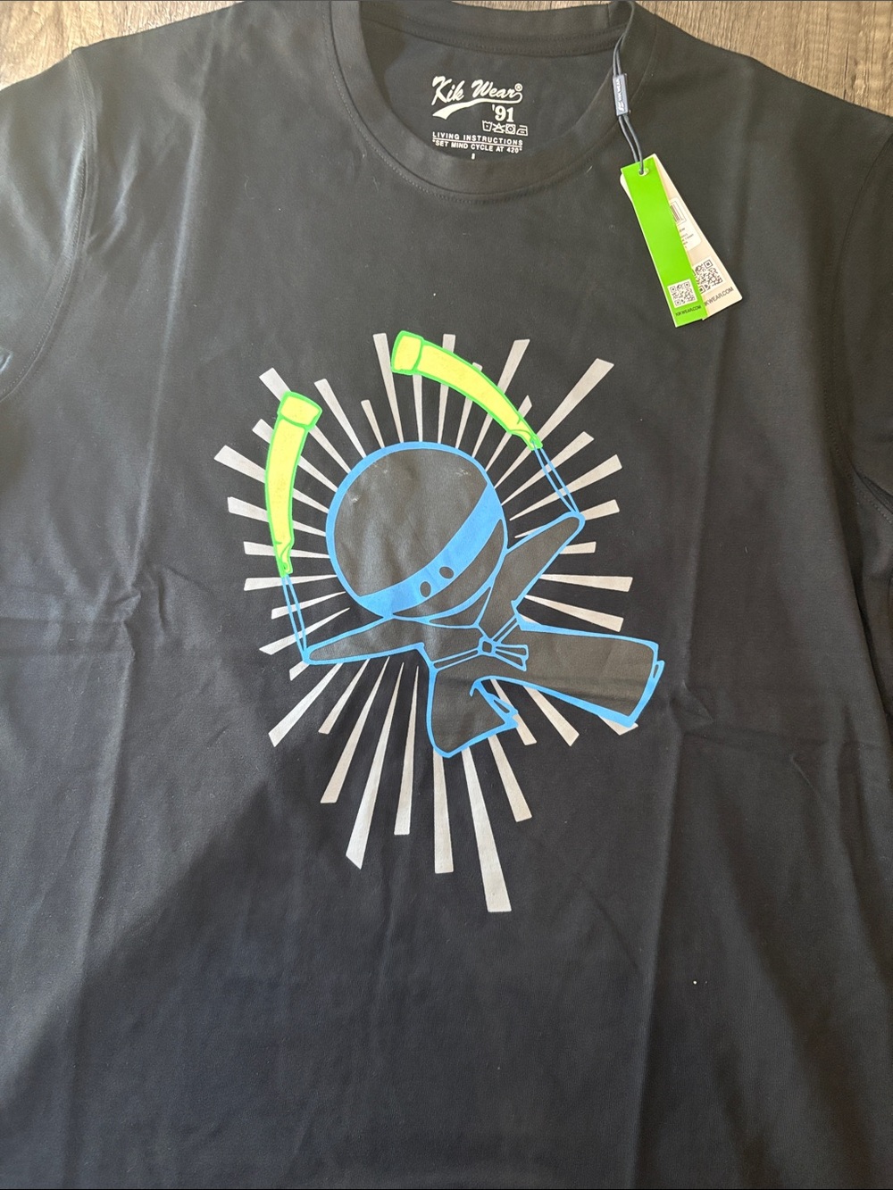 Kik Wear Black Short Sleeve Graphic Tee with Neon Accent